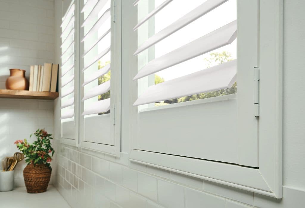 Hidden tilt composite shutters by Graber Blinds
