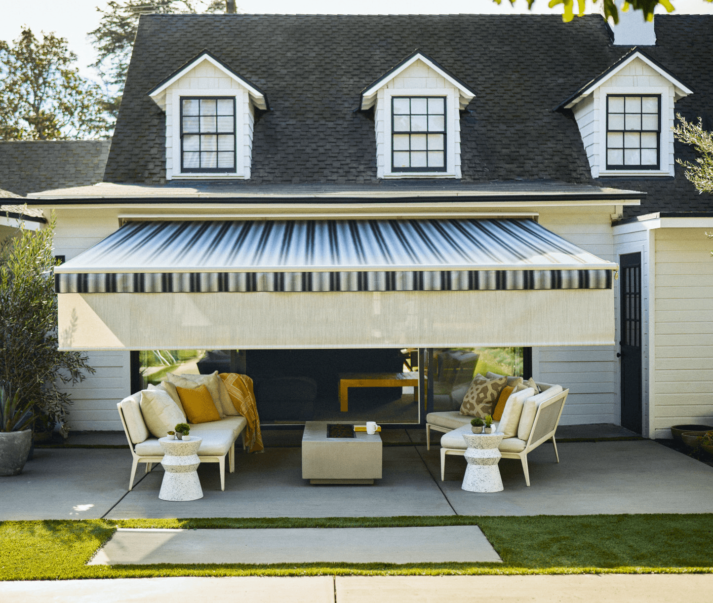 Platinum Plus SunSetter awning with dropped UV protection screen in front
