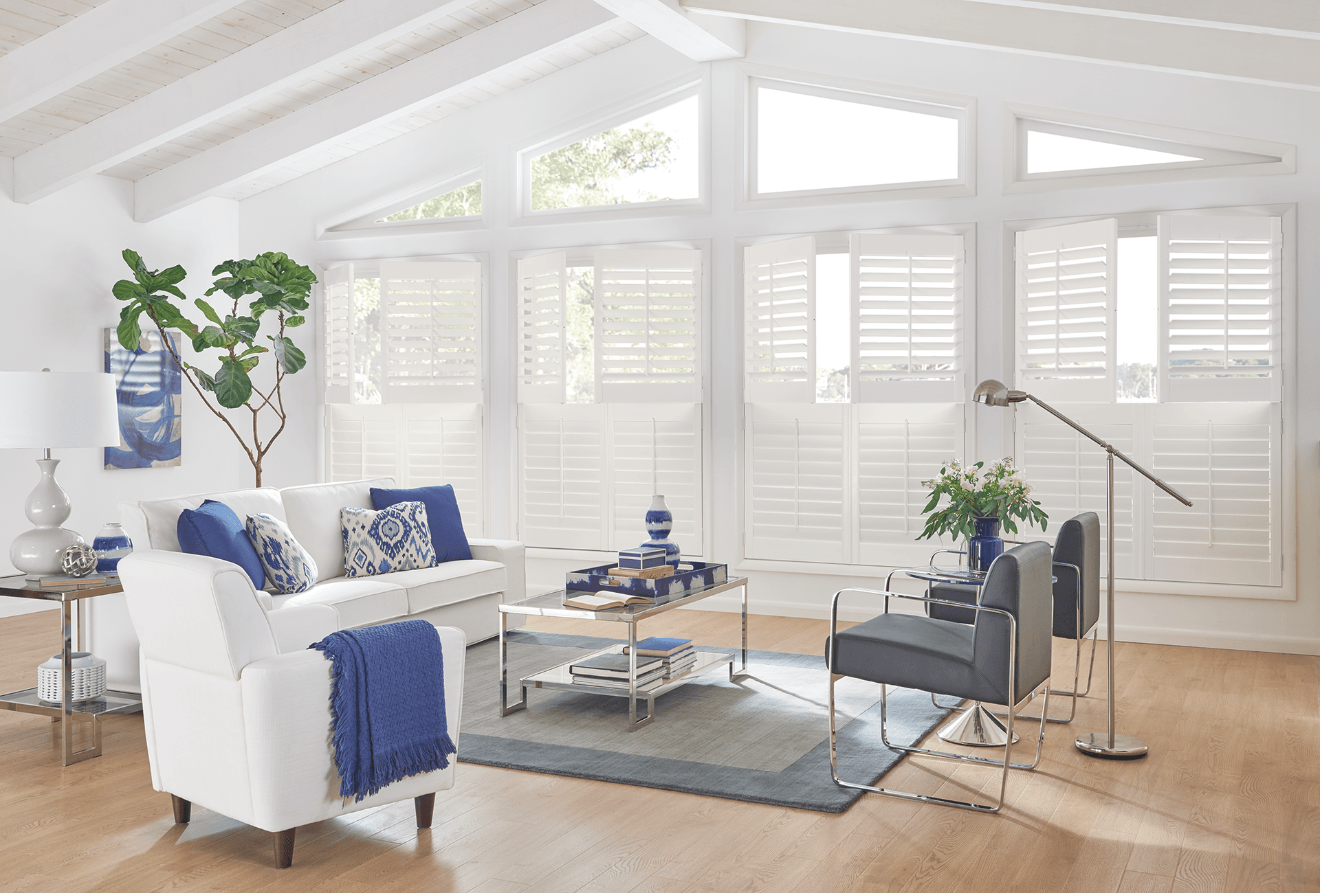 Graber Wood Shutters in Large room with Split shutters