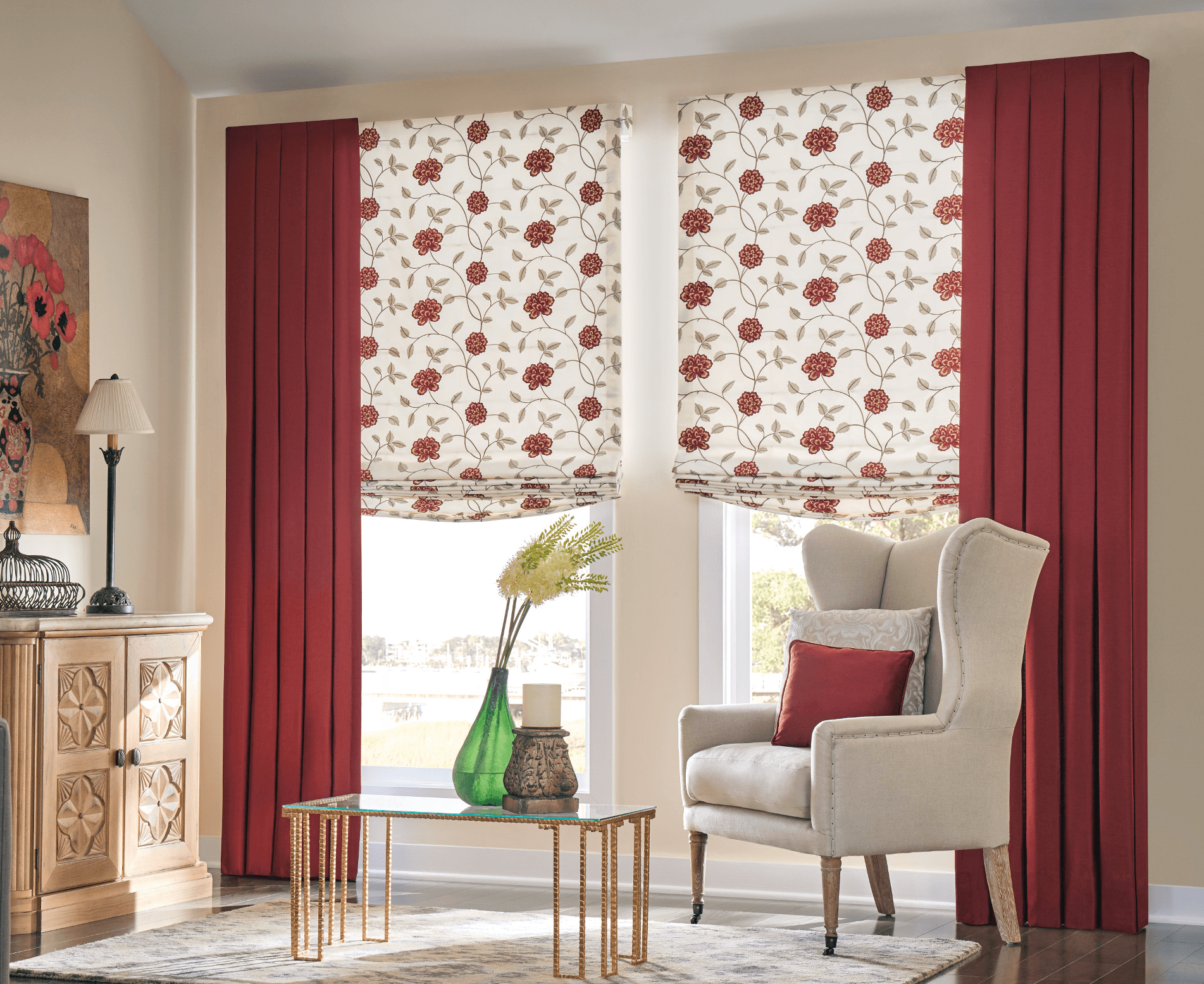 Graber roman shades and draperies with upholstered chair and custom accent pillows