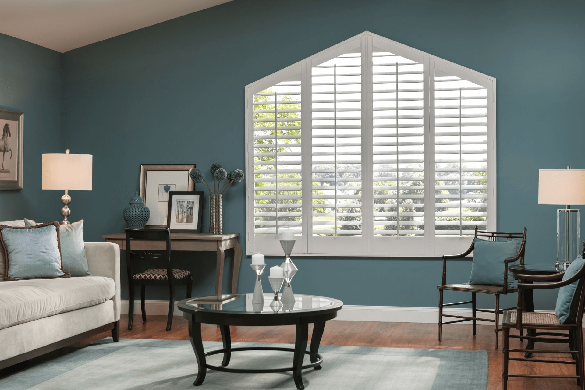 Triangle topped shutters in large window by Graber Blinds