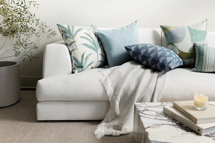 Sunbrella indoor upholstery, throw, and custom pillows