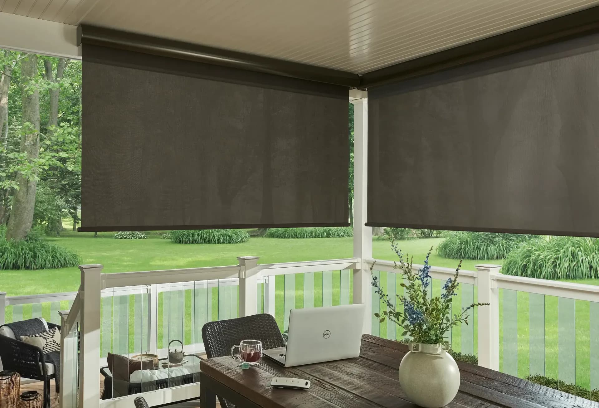 EasyShade lining porch with laptop and remote control